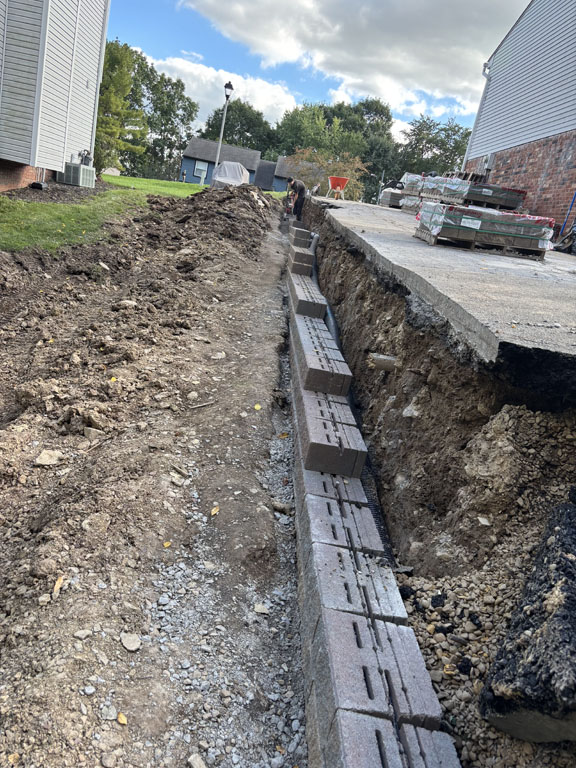 How a French Drain Protects Your Home From Standing Water